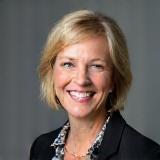 Professional headshot of Dr. Eleanor Vance, Lead Trainer.