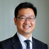 Professional headshot of Marcus Chen, Senior Trainer.